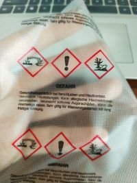Water-soluble film printed with hazard pictograms